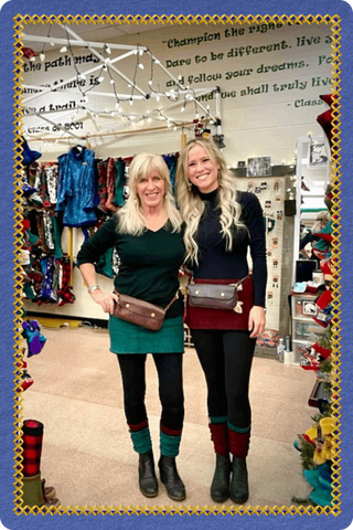 Twinkle Toes team at their Palmer, Alaska shop showcasing all-terrain socks and Wild Outerwear products
